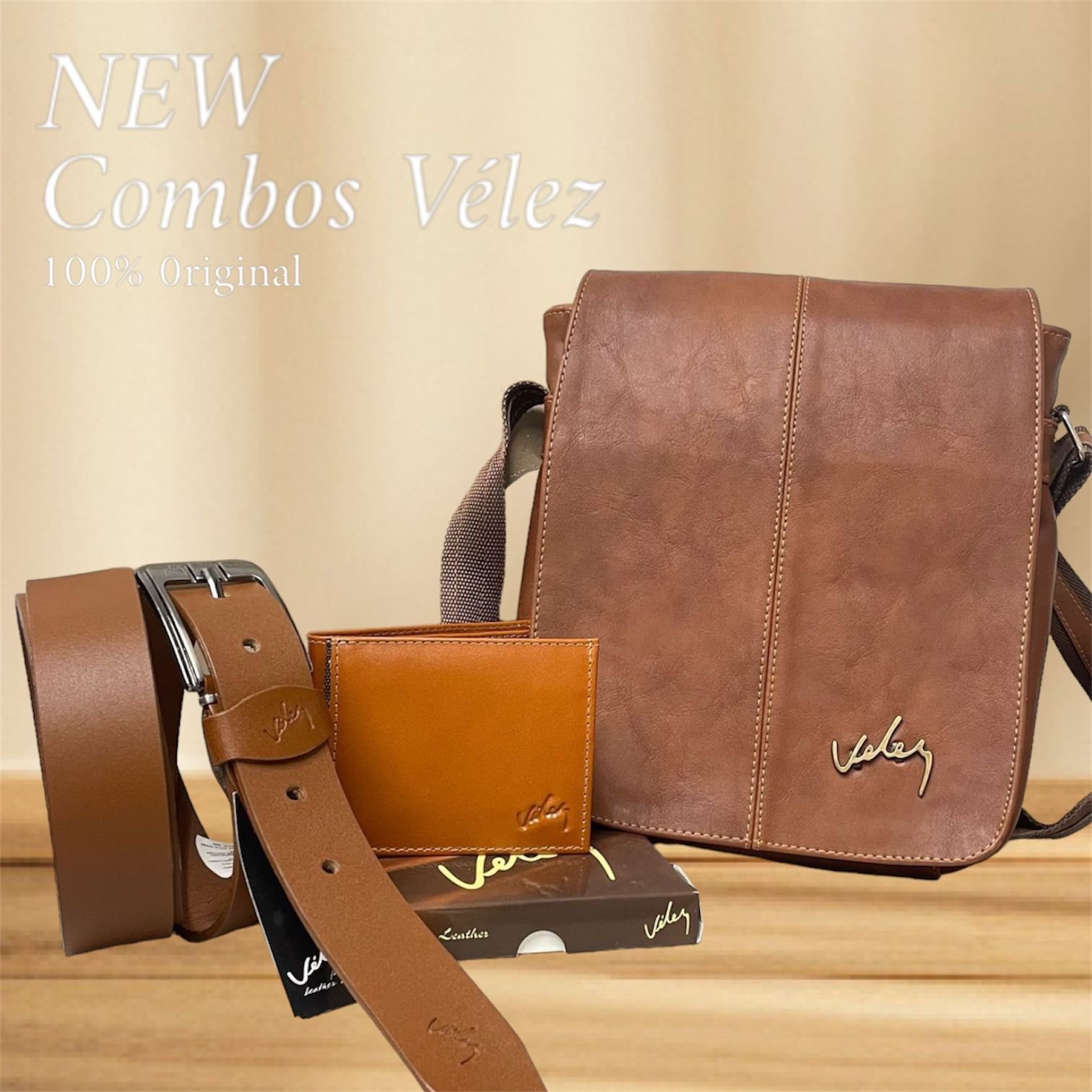 Set de accesorios ejecutivos para hombre que incluye un bolso manos libres estructurado, una billetera de diseño liso coordinado, un cinturón con hebilla metálica pulida y una caja de presentación de marca con herraje de firma.